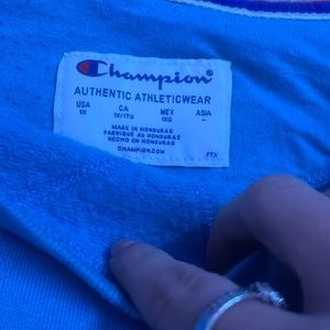 Light blue champion crew neck size large good condition